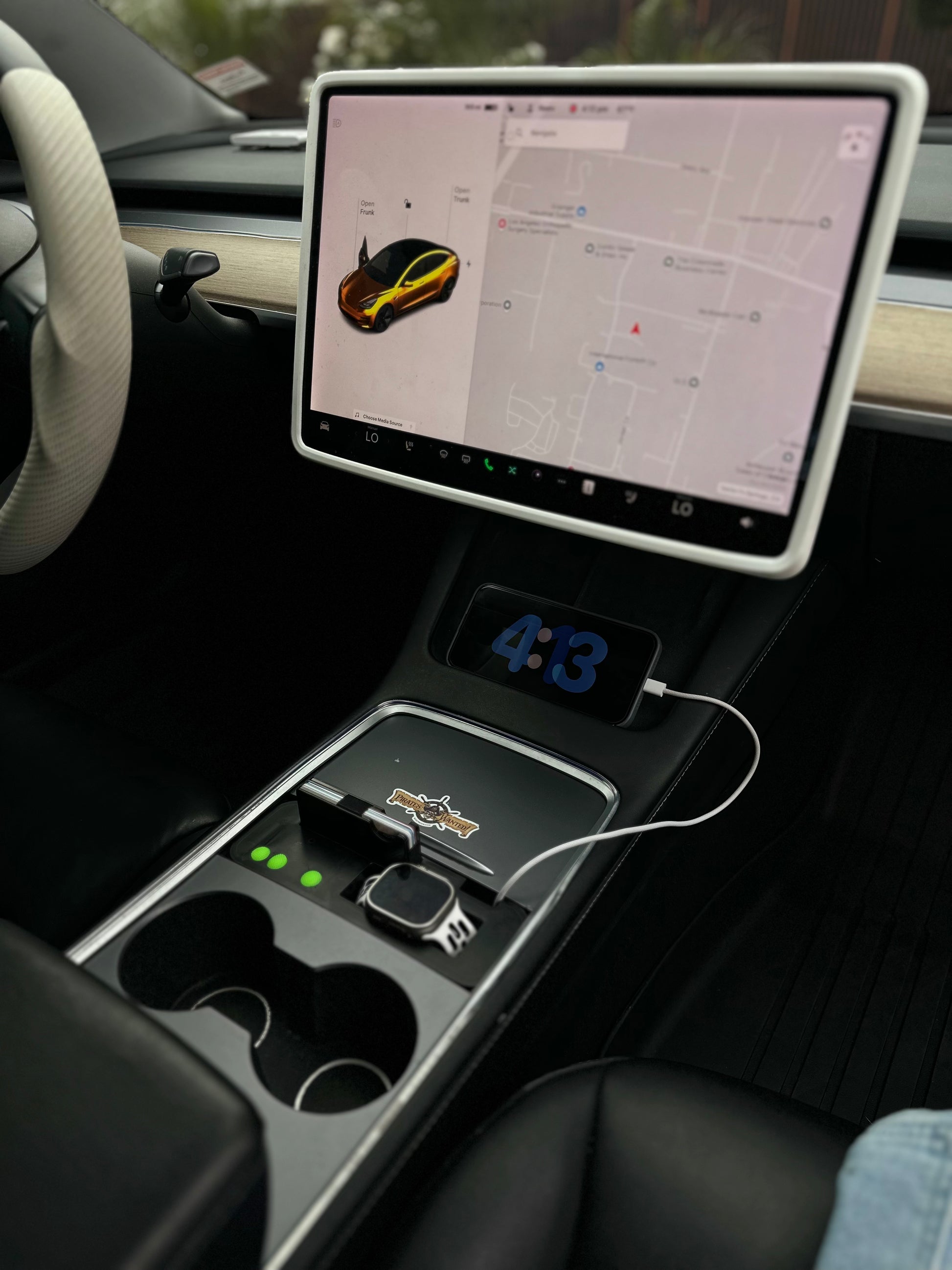 UniHub Control Panel for Tesla Model 3 & Model Y (2021–Present) installed in center console with device charging and organized compartments.