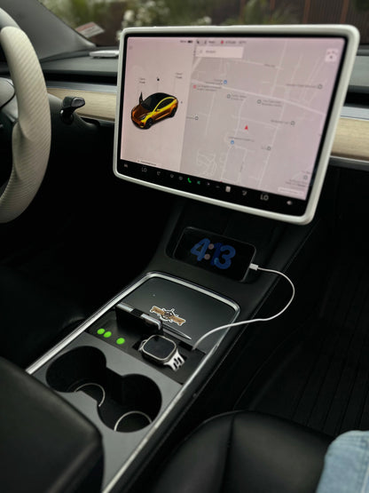 UniHub Control Panel for Tesla Model 3 & Model Y (2021–Present) installed in center console with device charging and organized compartments.