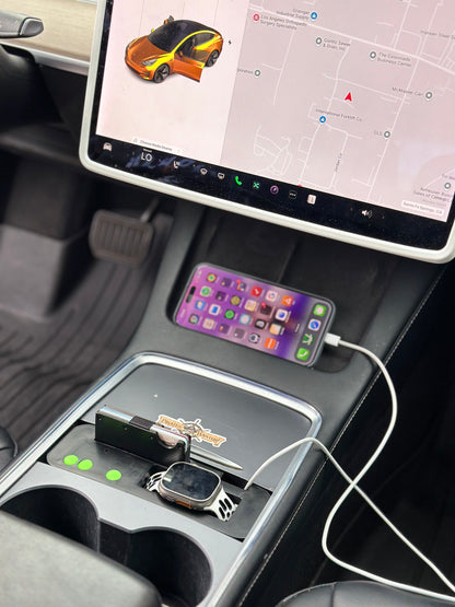 UniHub Control Panel for Tesla Model 3 & Model Y (2021–Present) installed in center console with phone charging and organized accessories.