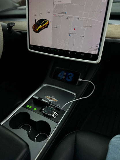 UniHub Control Panel for Tesla Model 3 & Model Y (2021–Present) installed in center console with charging ports and digital clock display.