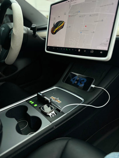 UniHub Control Panel for Tesla Model 3 & Model Y (2021–Present) installed in center console with phone charging and organized accessories.
