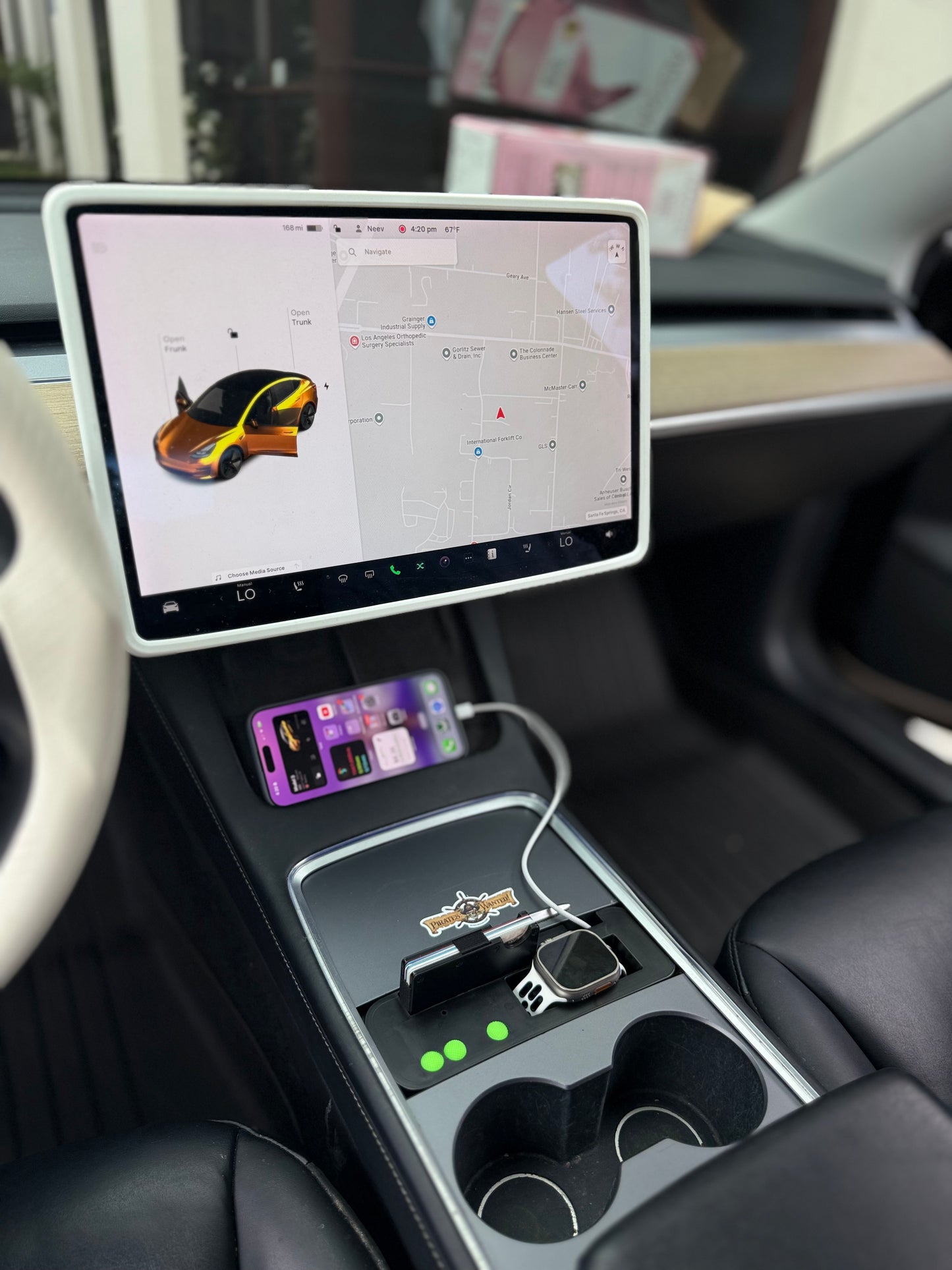 UniHub Control Panel for Tesla Model 3 & Model Y (2021–Present) installed in center console with wireless charging and device organization features.