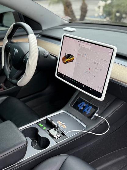 UniHub Control Panel for Tesla Model 3 & Model Y (2021–Present) installed in center console with organized charging ports and digital clock display.